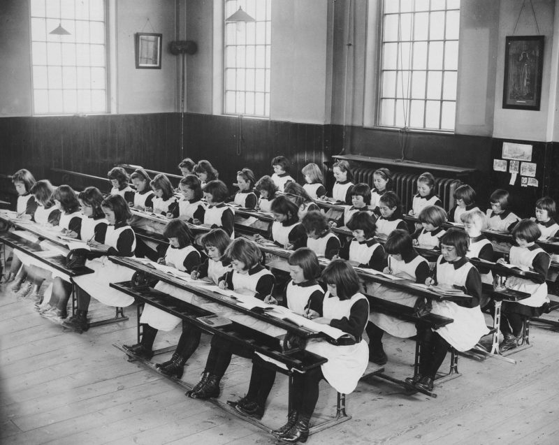 Girls in the London Foundling Hospital schoolroom, 20th century © Coram in the care of The Foundling Museum
